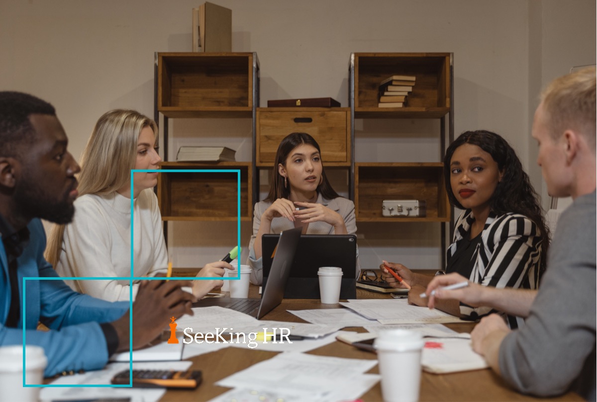 Diverse group of coworkers at a meeting.